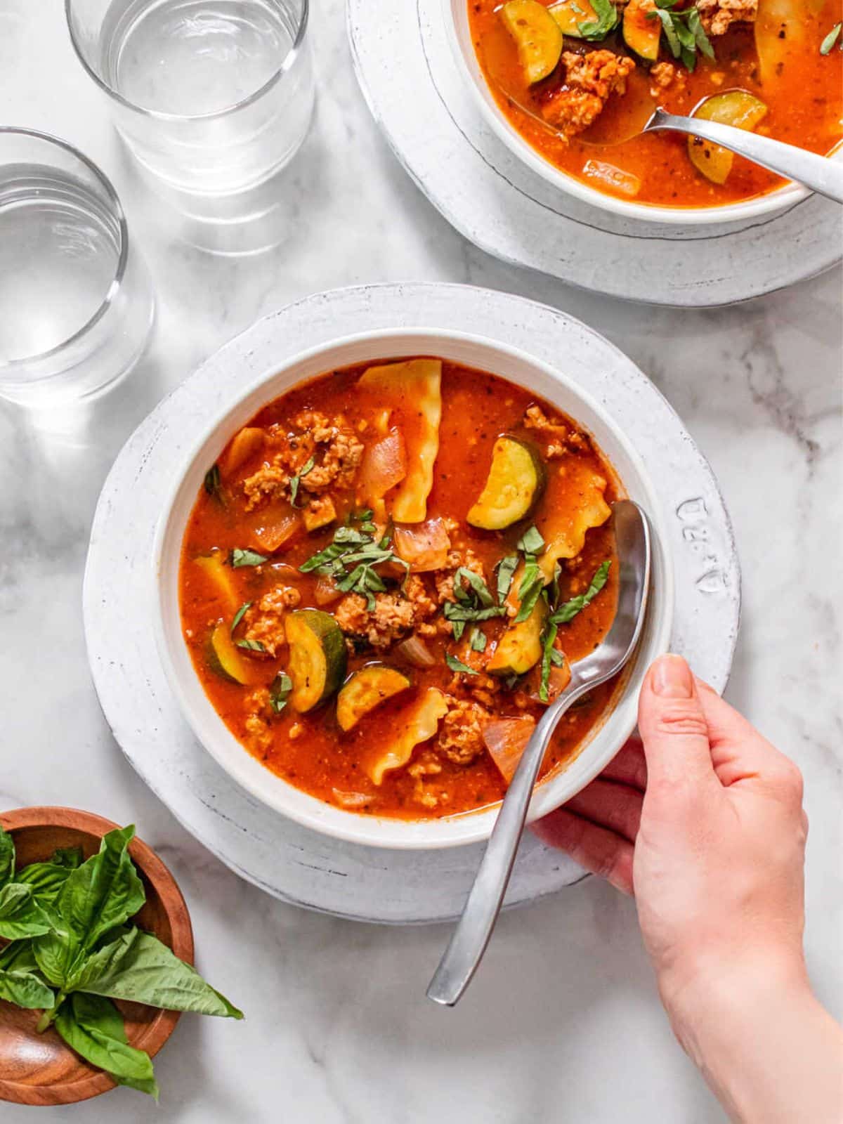 Healthy Lasagna Soup is packed with protein, veggies and fiber for a low calorie and gluten free soup recipe that's delicious and flavorful. 