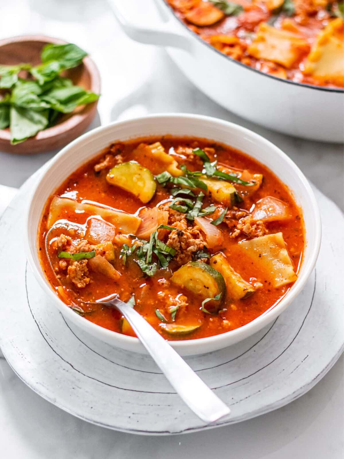 Healthy Lasagna Soup is packed with protein, veggies and fiber for a low calorie and gluten free soup recipe that's delicious and flavorful. 
