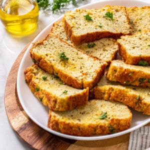 Healthy Cauliflower Bread is low carb, high protein, gluten free and low calorie. A healthy bread recipe packed with nutrition, protein and delicious flavors!