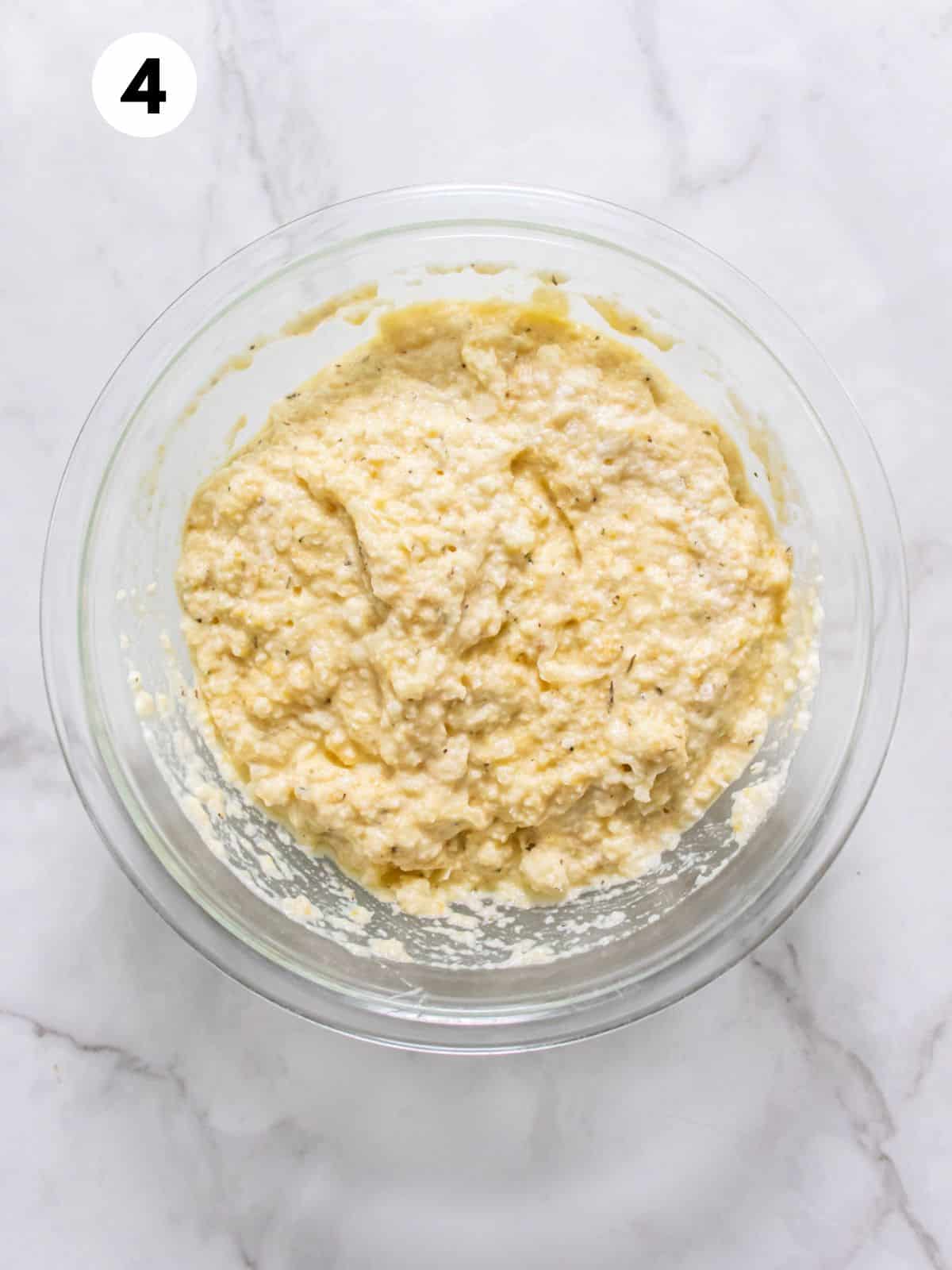 Cauliflower bread batter mixed in a bowl. 
