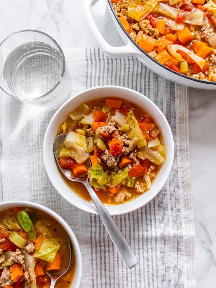 Healthy Cabbage Soup is a hearty vegetable and protein filled low calorie soup. An easy healthy cabbage soup bursting with spices and delicious flavors that's great for healthy eating!