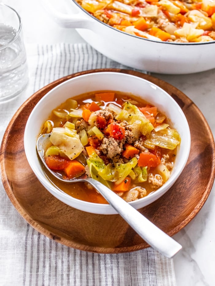 Healthy Cabbage Soup is a hearty vegetable and protein filled low calorie soup. An easy healthy cabbage soup bursting with spices and delicious flavors that's great for healthy eating!