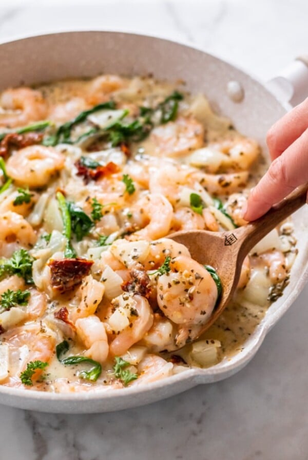 Healthy Tuscan Shrimp is made better for you with fewer calories, gluten free with healthy fat and protein for a delicious and balanced meal! Serve over rice or cauliflower rice.