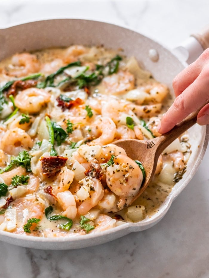 Healthy Tuscan Shrimp is made better for you with fewer calories, gluten free with healthy fat and protein for a delicious and balanced meal! Serve over rice or cauliflower rice.