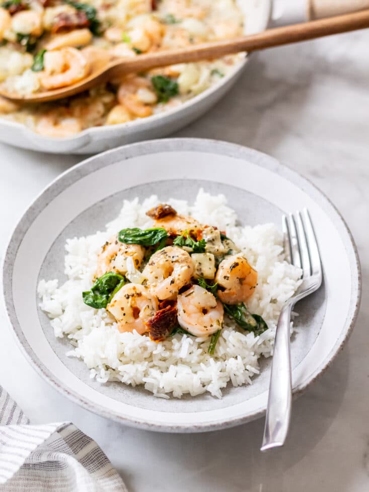 Healthy Tuscan Shrimp is made better for you with fewer calories, gluten free with healthy fat and protein for a delicious and balanced meal! Serve over rice or cauliflower rice.