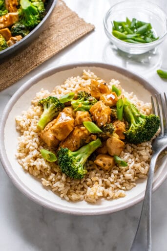 Healthy Ginger Chicken Broccoli Stir Fry is a low calorie meal that is easy, filling and delicious and made gluten free!