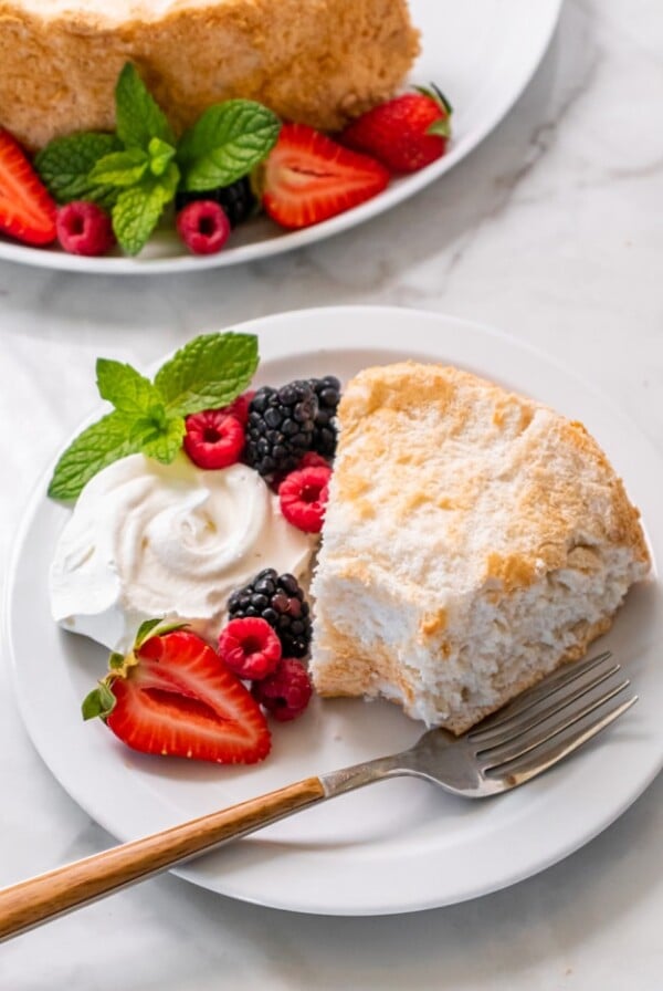 Healthy Angel Food Cake is low calorie, gluten free and made sugar free. The best light and fluffy angel food cake.