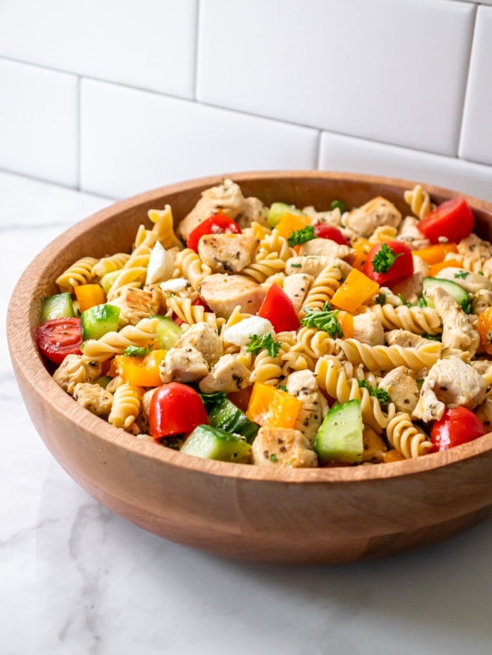 An easy Healthy Greek Chicken Pasta Salad that is perfect as a low calorie meal, appetizer or side dish. Higher protein and gluten free! 