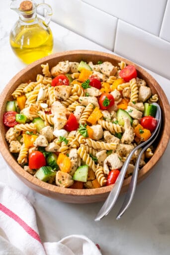 An easy Healthy Greek Chicken Pasta Salad that is perfect as a low calorie meal, appetizer or side dish. Higher protein and gluten free!