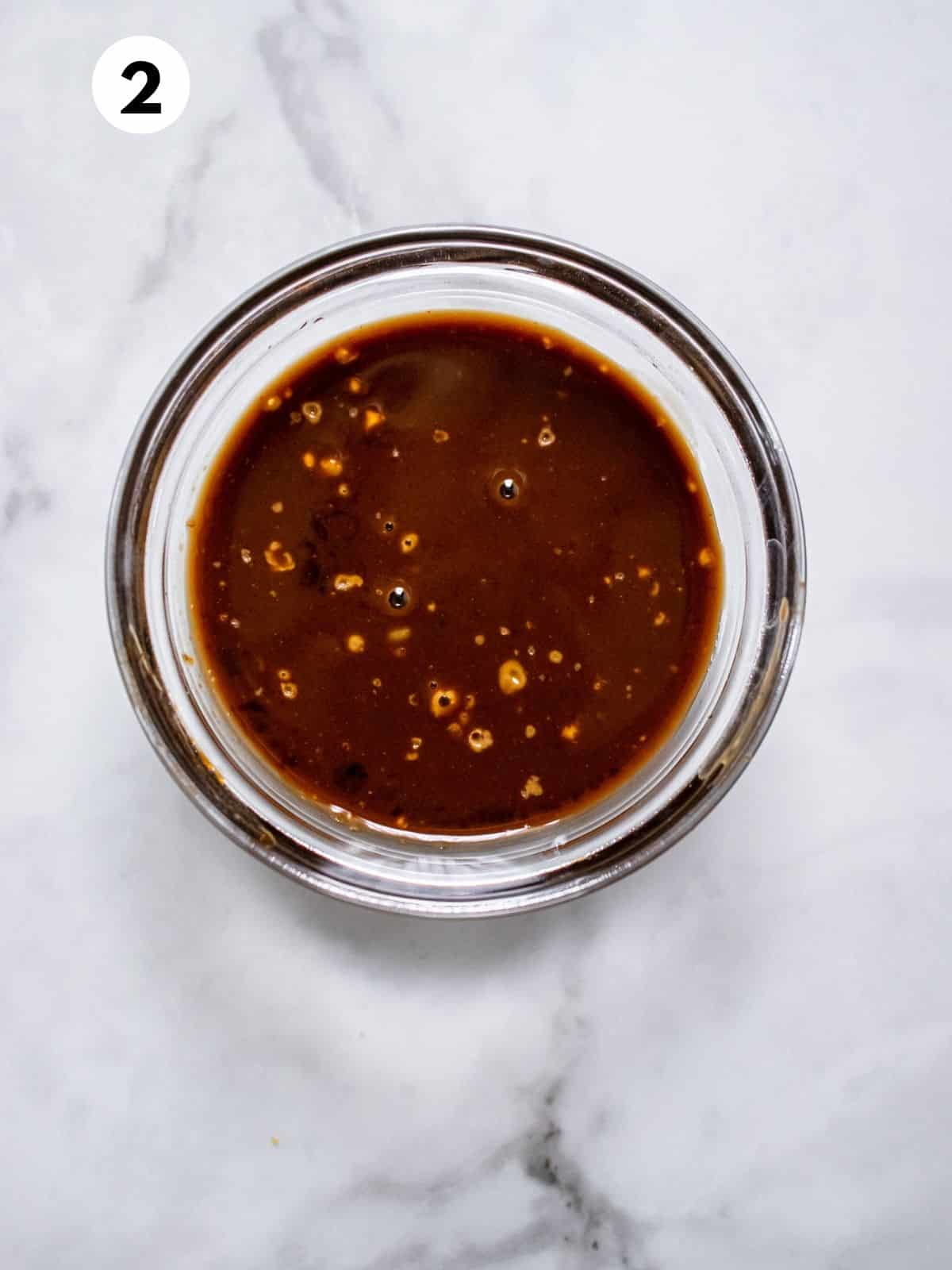 Stir fry sauce in a small glass bowl. 