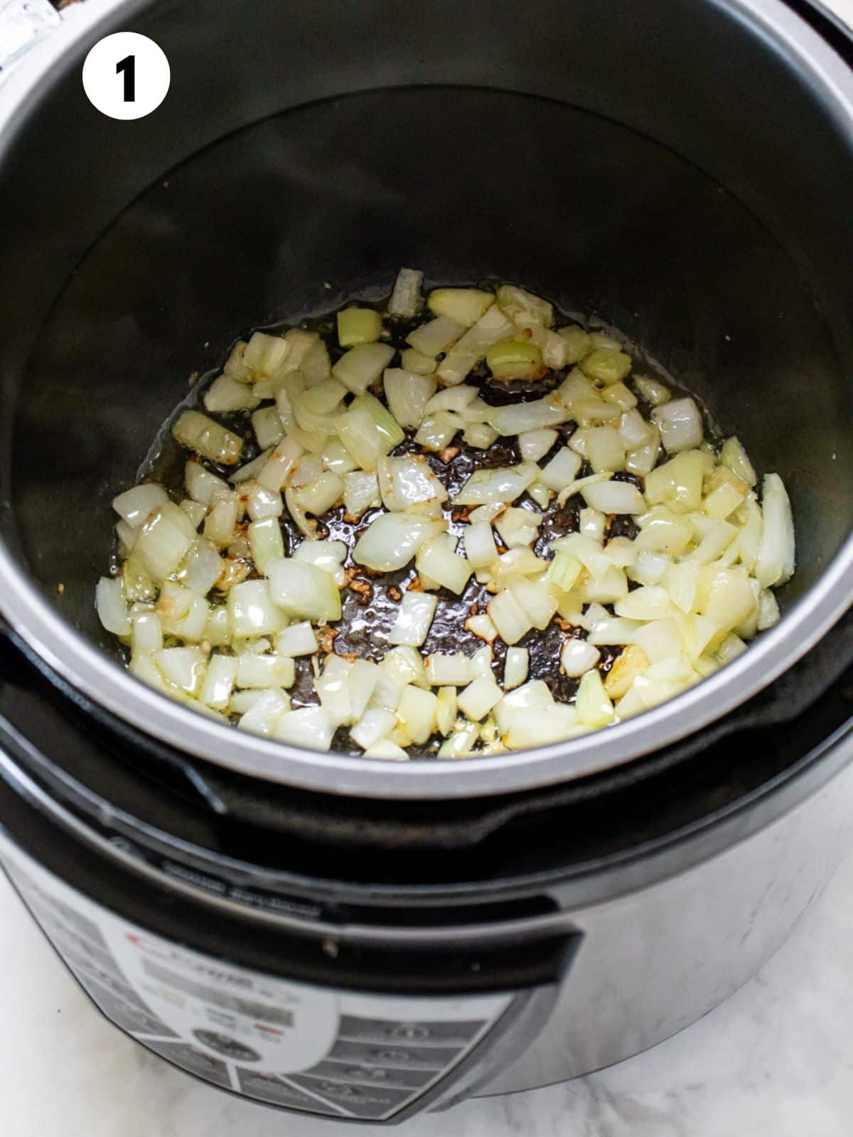 Onions cooking in an Instant pot.