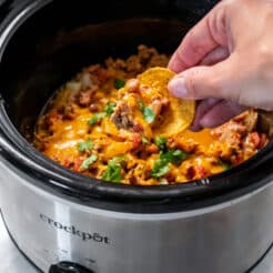 Healthy Crockpot Chili Cheese Dip is packed with protein and fiber to make a lower calorie appetizer.