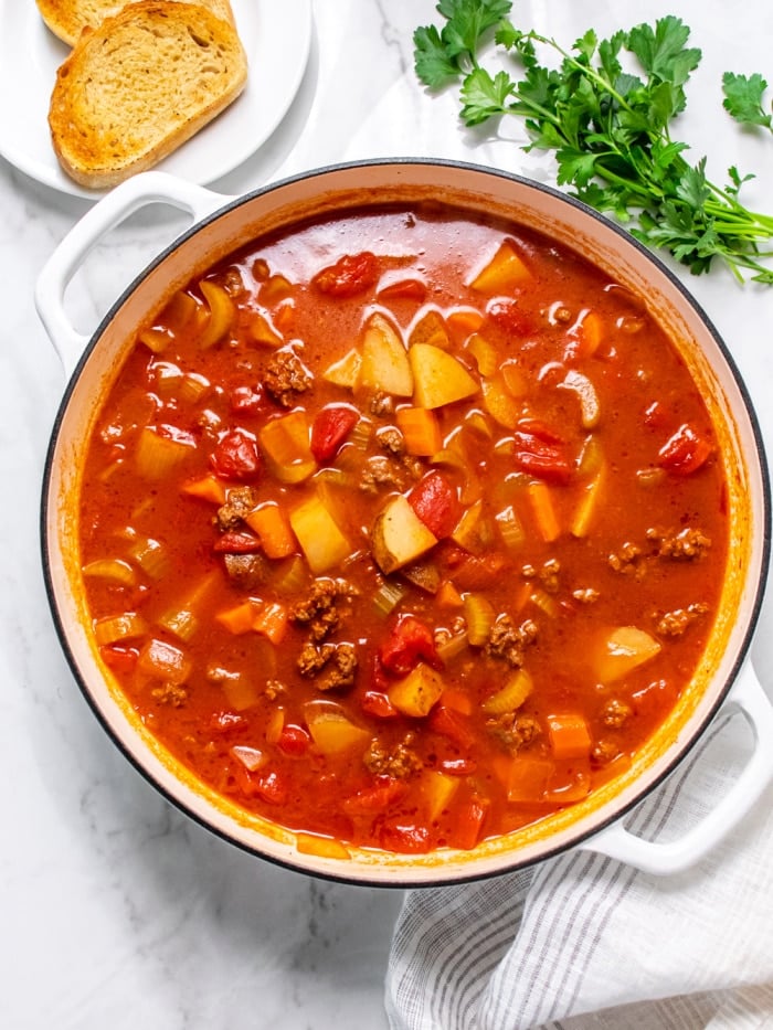 Healthy Beef Vegetable Soup is a simple low calorie homemade soup recipe. Easy to make on the stovetop, slow cooker or Instant Pot for a hearty dinner. 