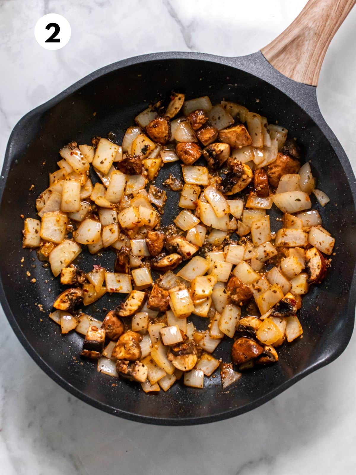 Mushrooms and onions added to cook with the chicken.