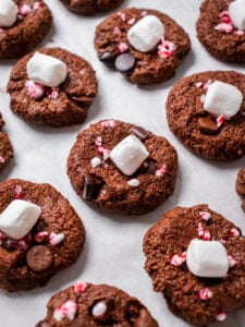 Healthy Peppermint Hot Chocolate Cookies are low calorie and gluten free. Made gooey on the inside and chewy on the outside, these lighter holiday cookies are fun and easy!