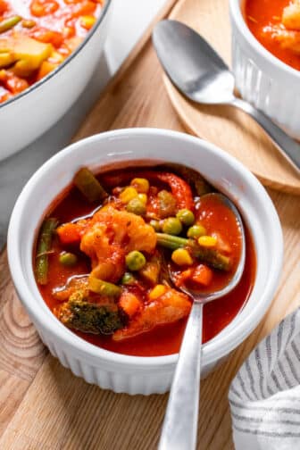 Healthy Frozen Vegetable Soup is simple, low calorie soup recipe packed with fiber and delicious flavors! Add a lean protein to make it a nutritionally balanced meal or serve it as a veggie side!