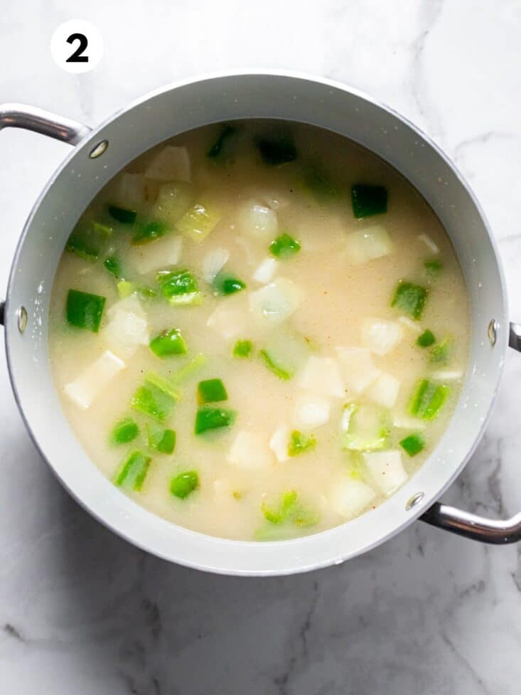 Cornstarch and a little bit of broth is added to the cooked vegetables.