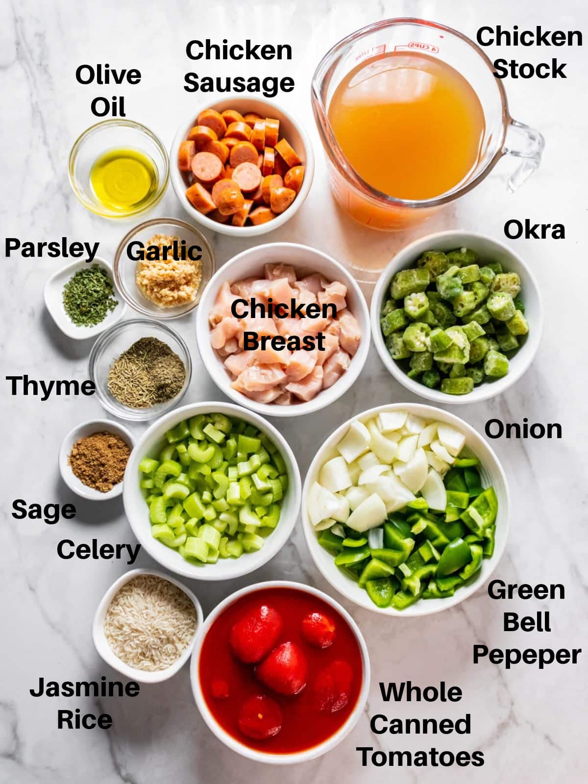 Ingredients for crockpot chicken gumbo in bowls on the table before preparing.