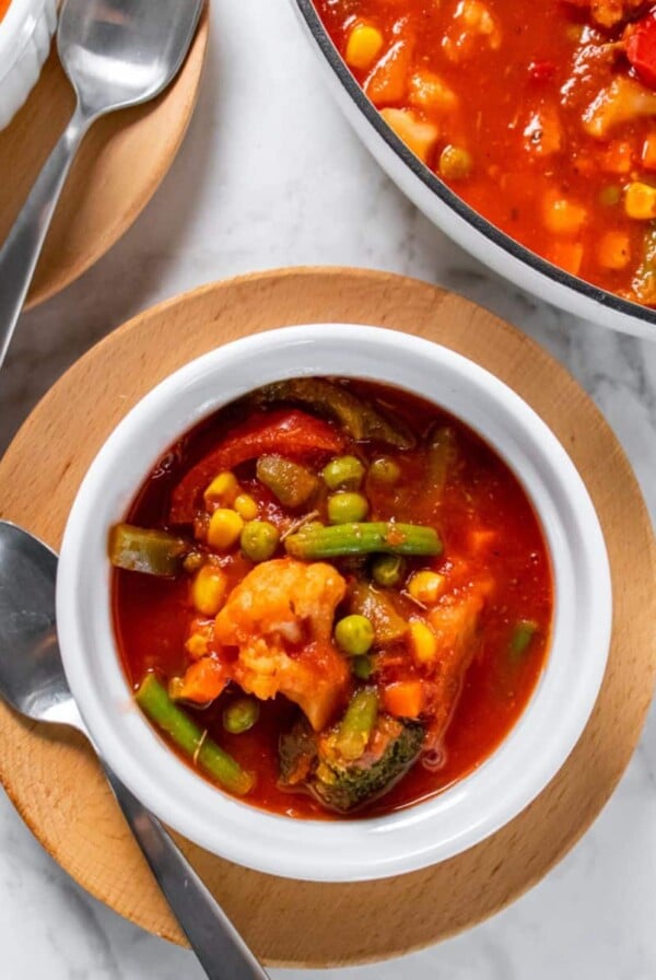 Healthy Frozen Vegetable Soup is simple, low calorie soup recipe packed with fiber and delicious flavors! Add a lean protein to make it a nutritionally balanced meal or serve it as a veggie side!