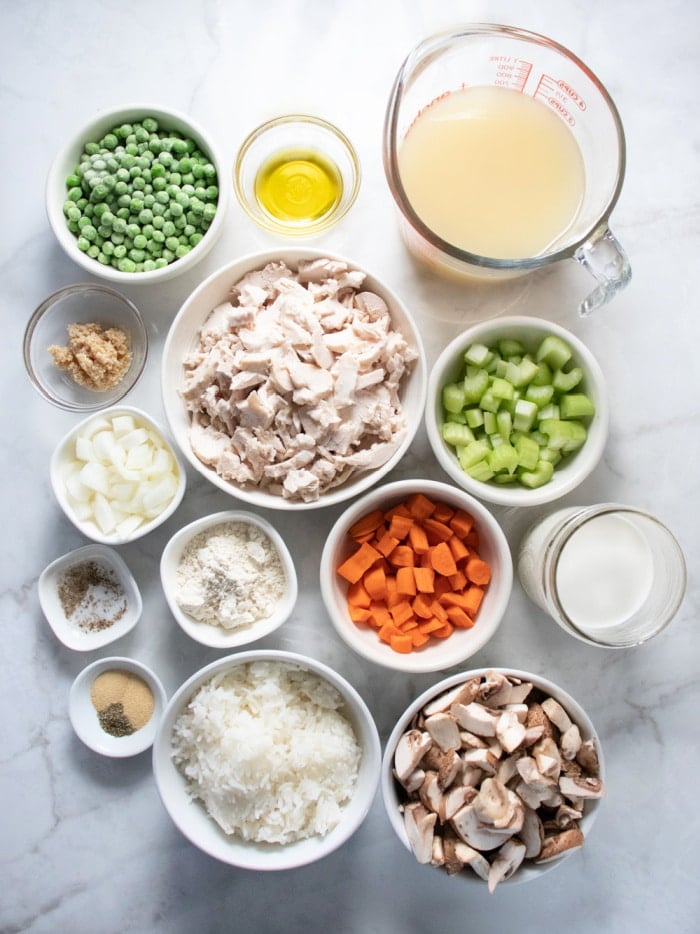 food ingredients in white bowl on a marble countertop