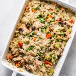 white casserole dish with chicken and vegetables