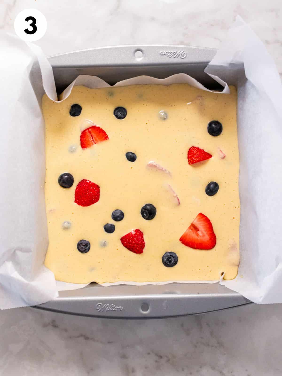 Baked yogurt batter poured into a baking dish.
