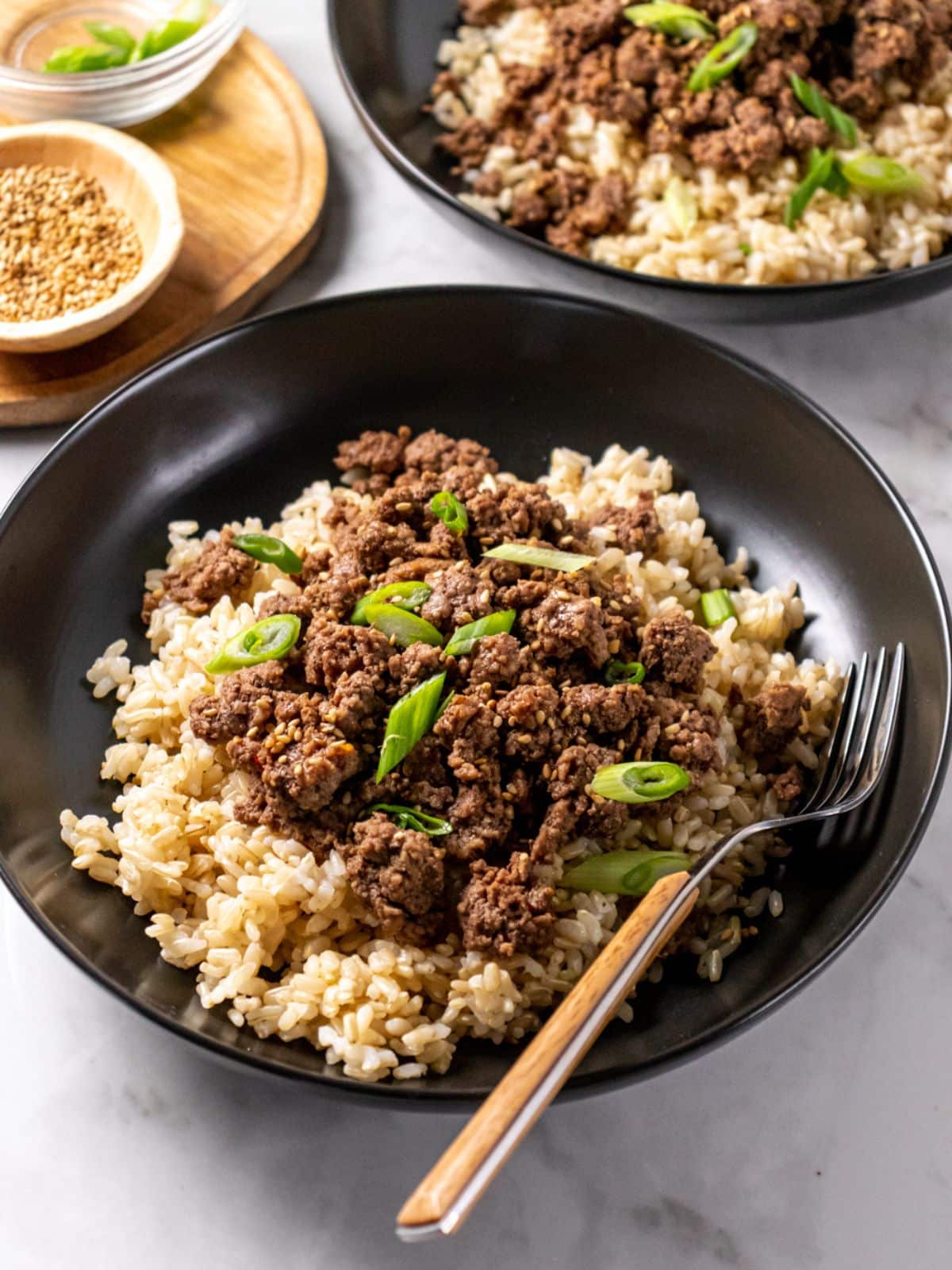 black bowl with asian beef and rice