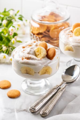 clear glass with banana pudding and wafers on top