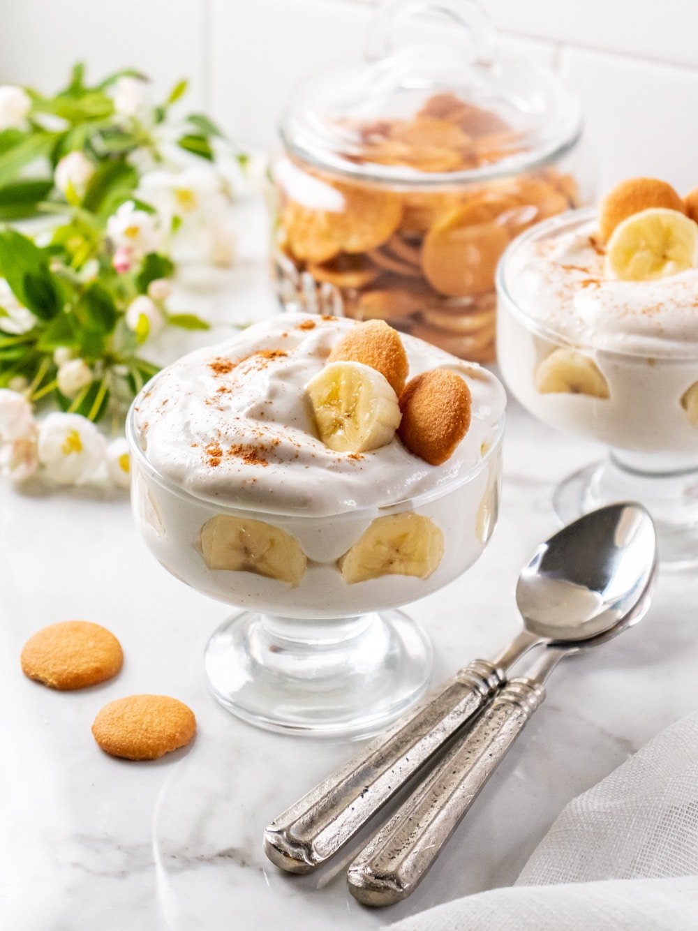 clear glass with banana pudding and wafers on top