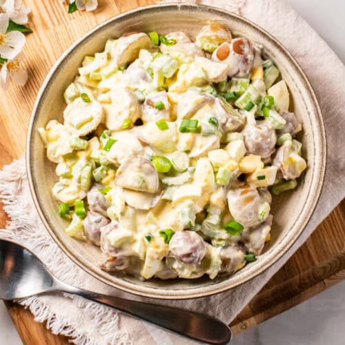 potato salad in a tan bowl