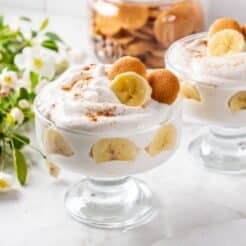 Healthy banana pudding in glasses on a table.