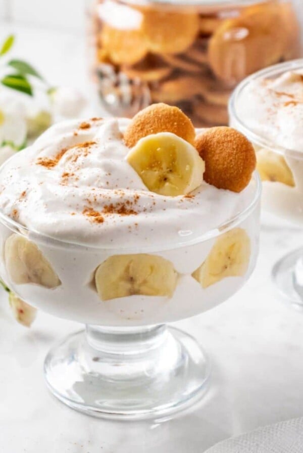 Healthy banana pudding in glasses on a table.