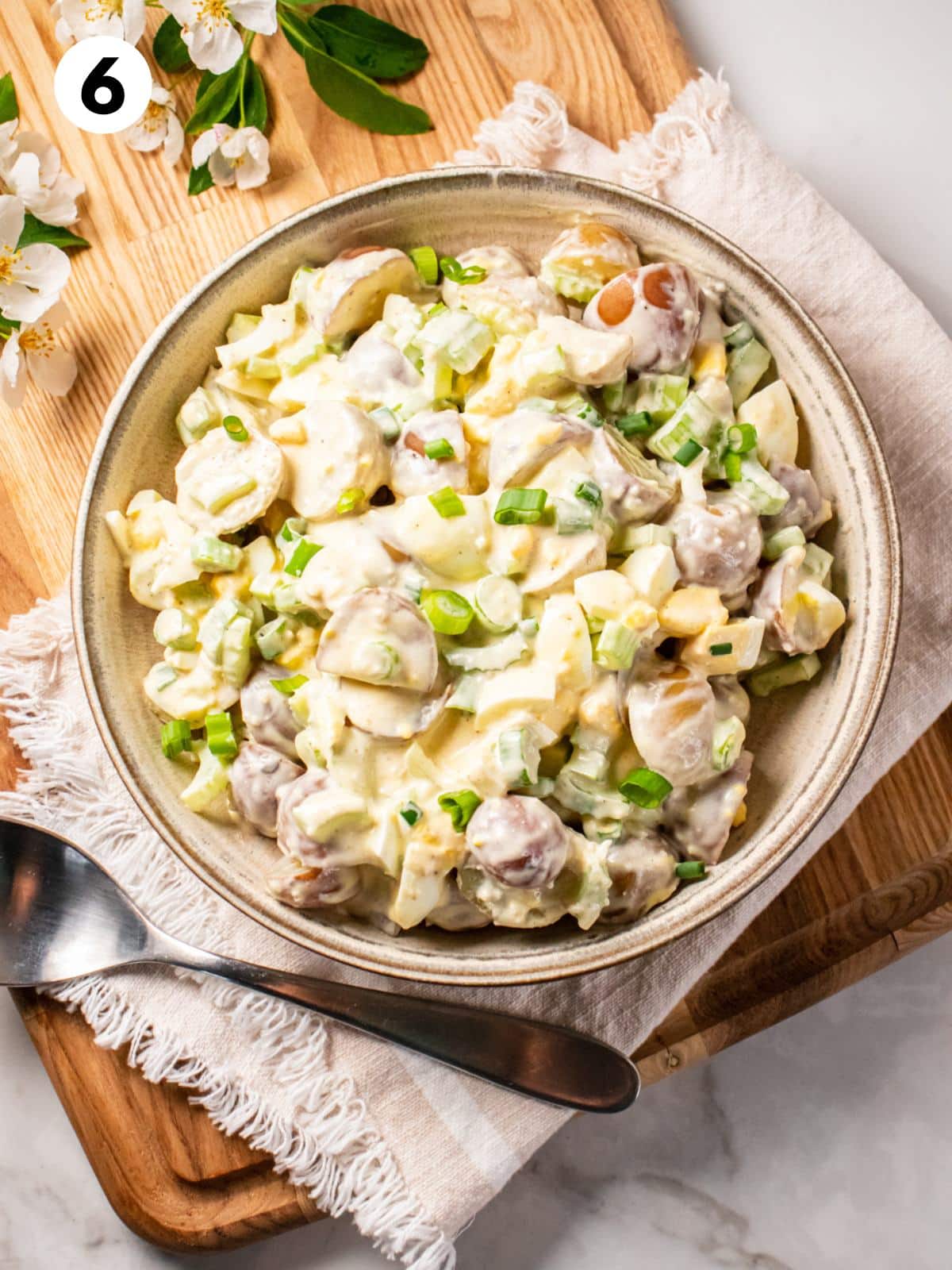 A bowl of low calorie potato salad ready to serve.