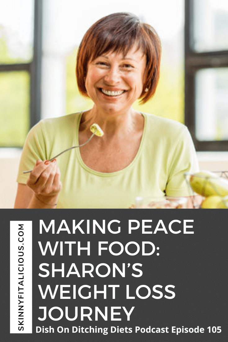 older woman smiling with a fork of food.