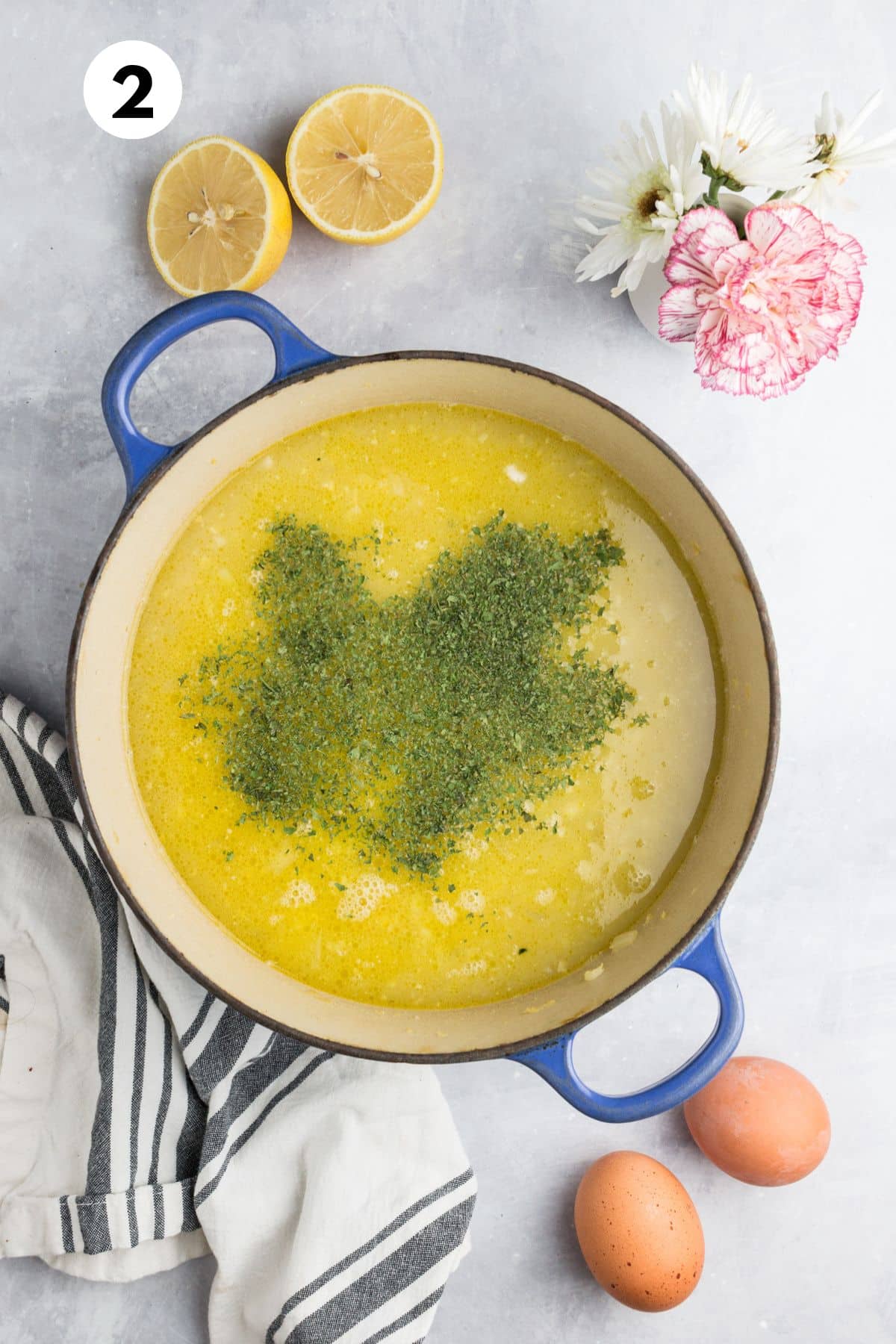 Broth and parsley added to the pot.