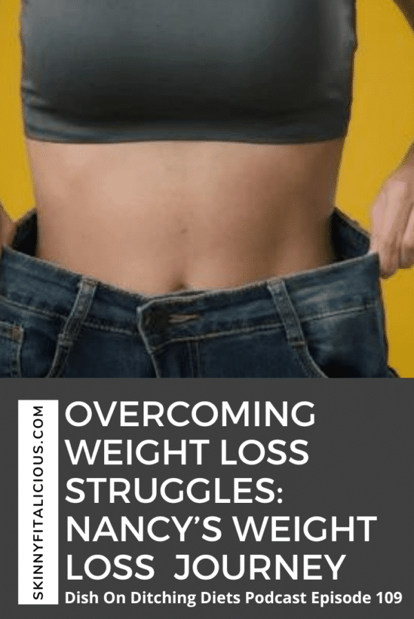 woman with pulling baggy pants away from her body to show weight loss.