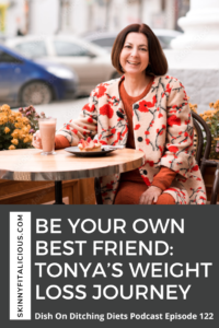 50 year old woman sitting with a slice of cake.