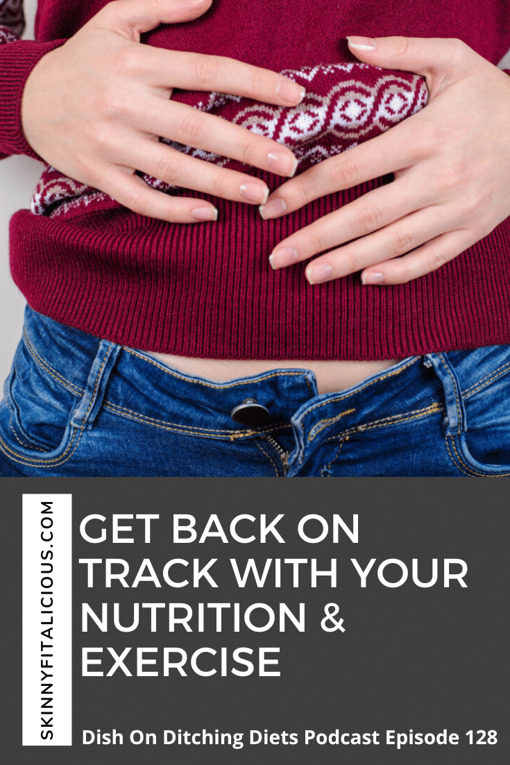 woman in a holiday sweater with her hands on her stomach from overeating.