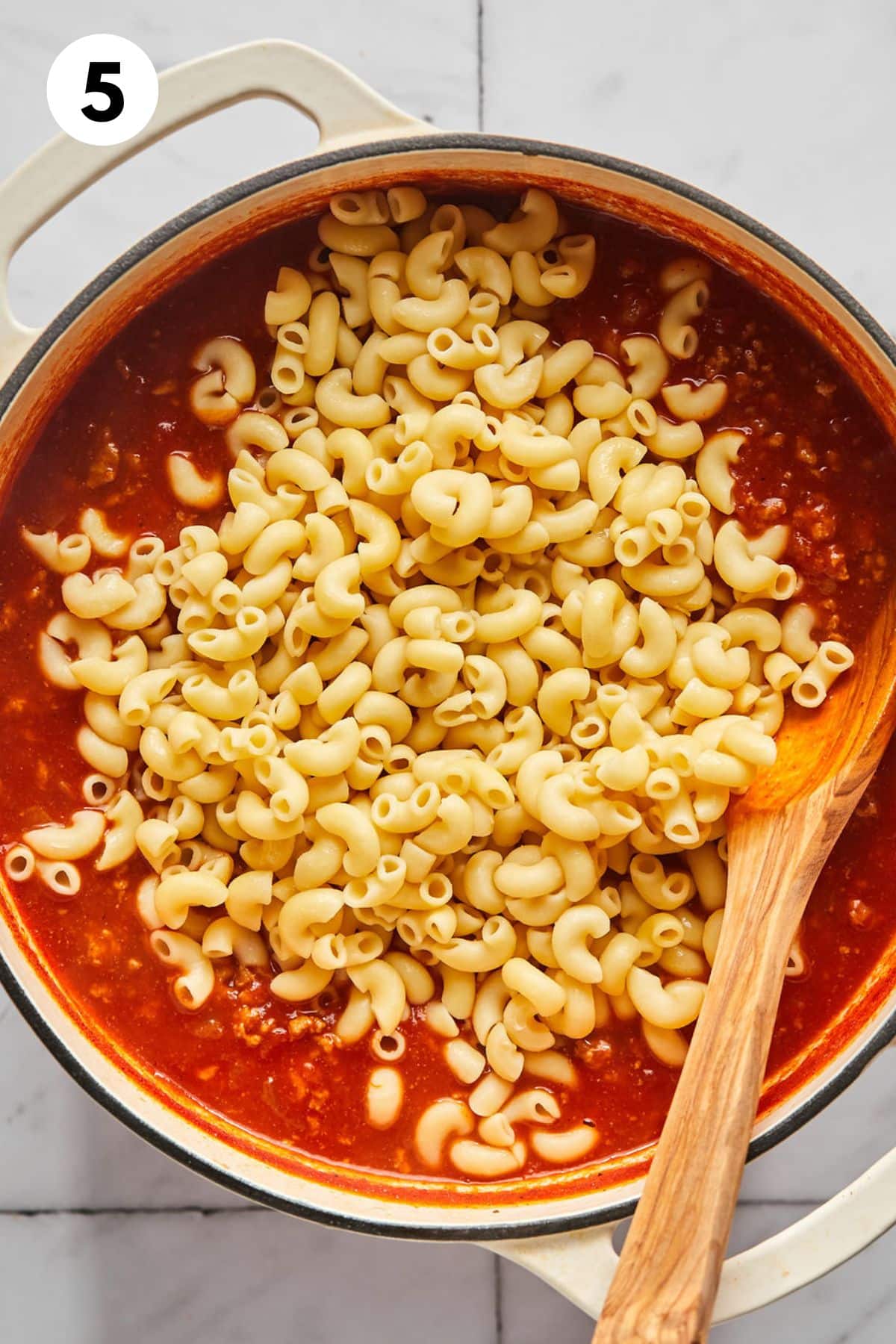 Pasta added to the pot.