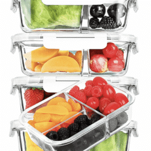 4 glass meal prep containers with fruit inside.