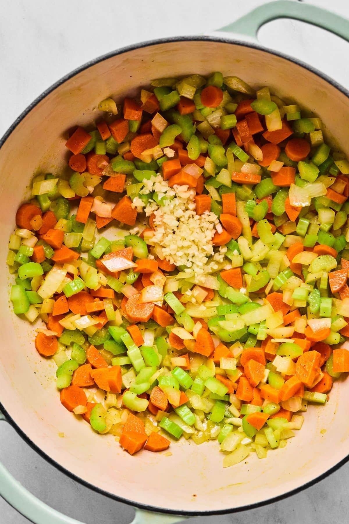 Chopped veggies in a pot.