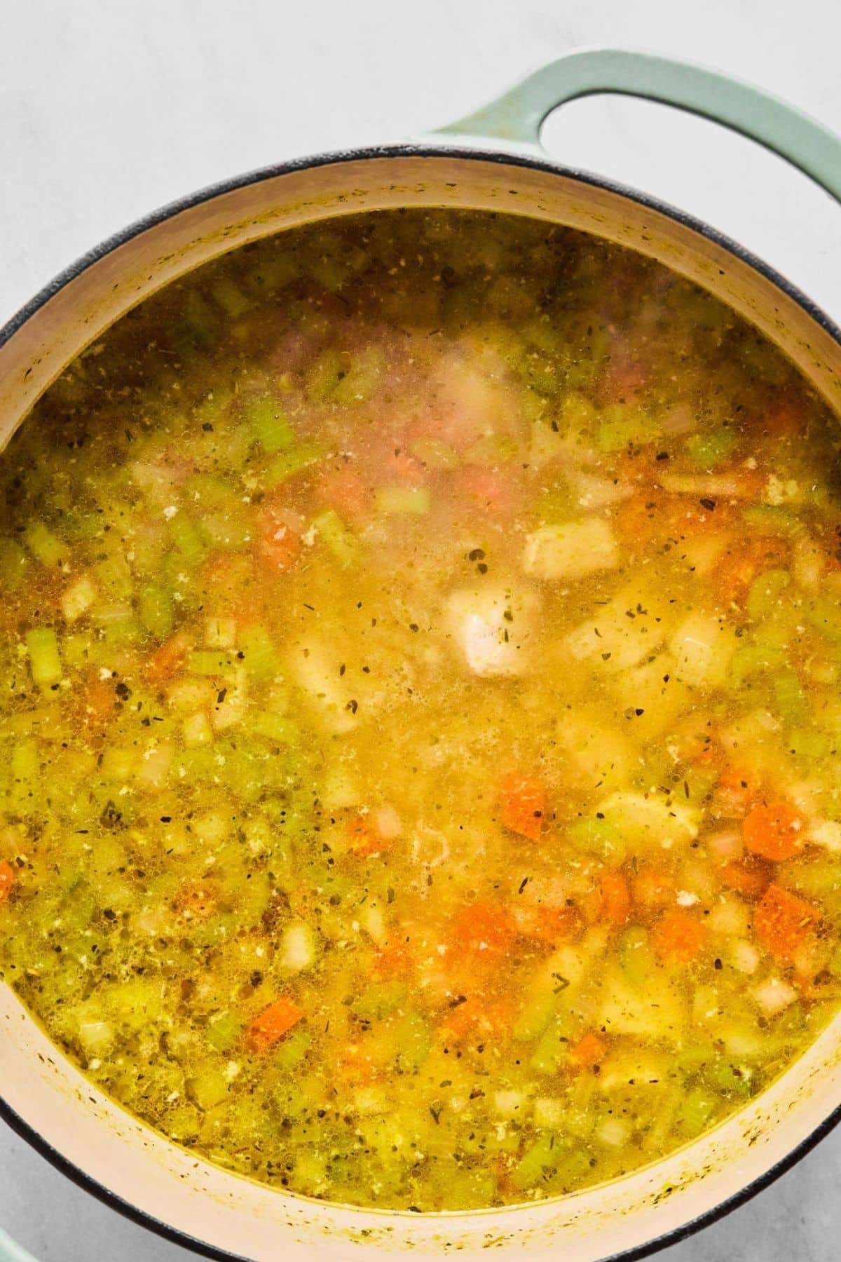 Orzo stirred into the pot.