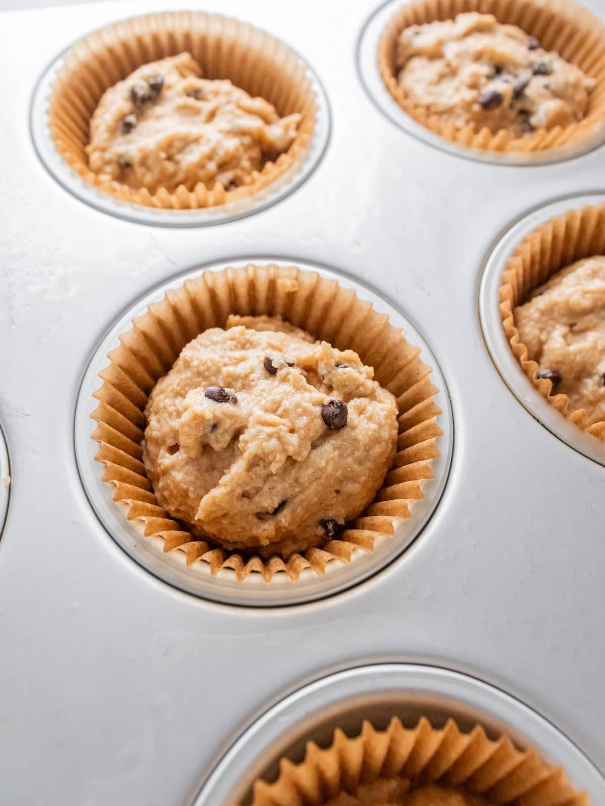 Protein powder muffins added to the baking pan.
