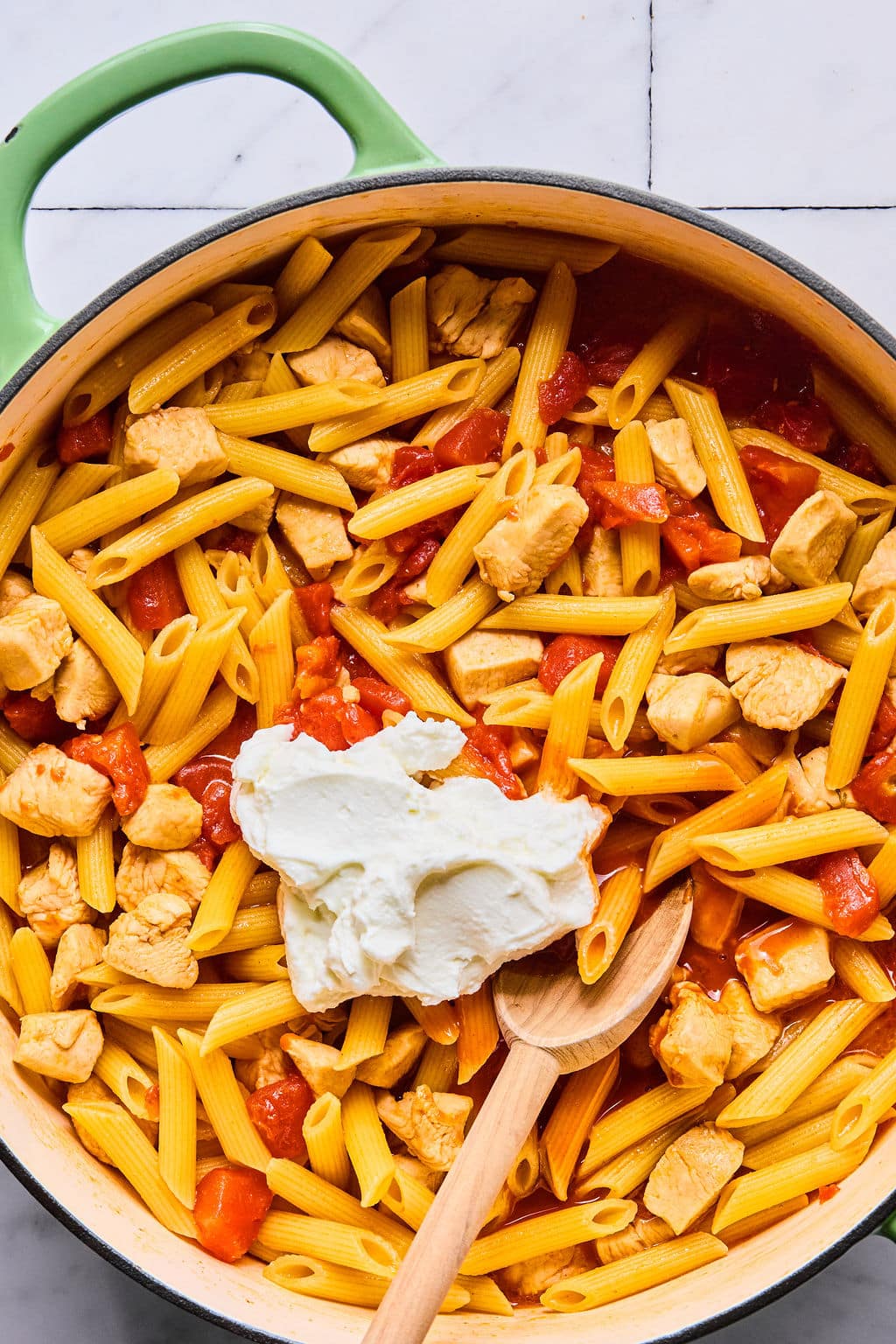Cooked pasta with cottage cheese added.
