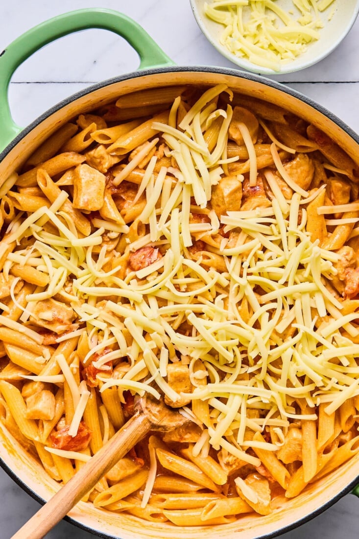 Cheese added to the skillet.