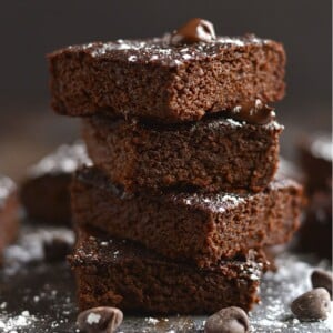 Beet brownies stacked on top of one another.
