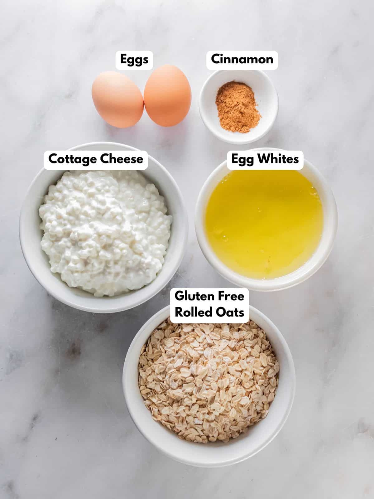 Ingredients to make these healthy cottage cheese waffles in bowls on the table.
