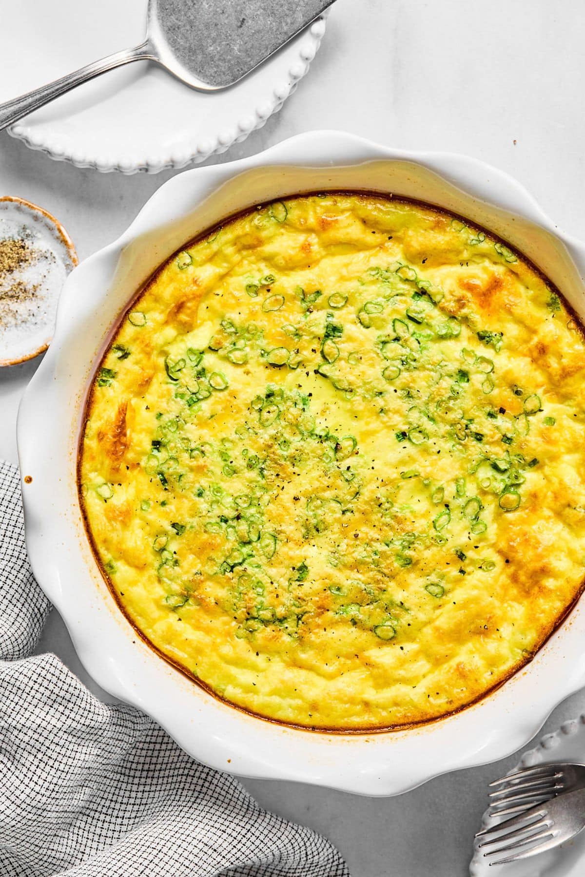 Quiche without crust in a dish.