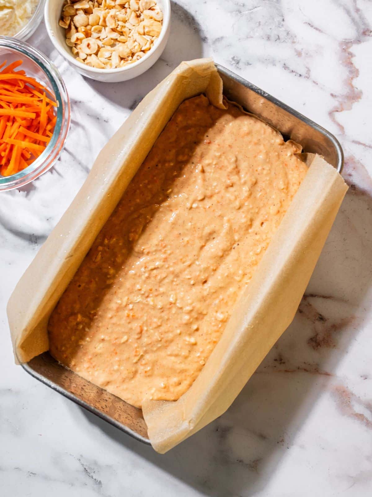 The batter poured into a cake pan.