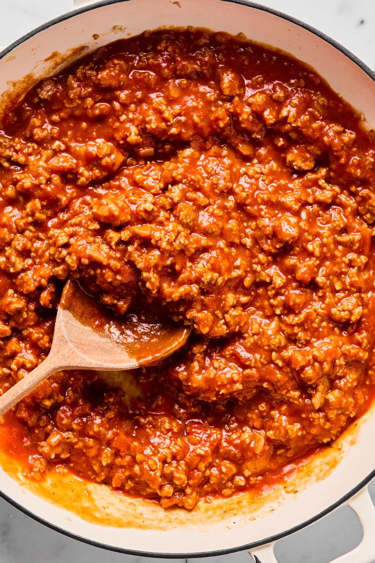 Marinara sauce added to the ground chicken.